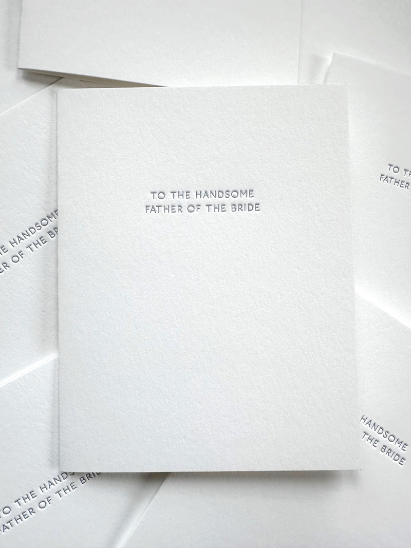 White card with text 'To the handsome father of the bride' on a white background