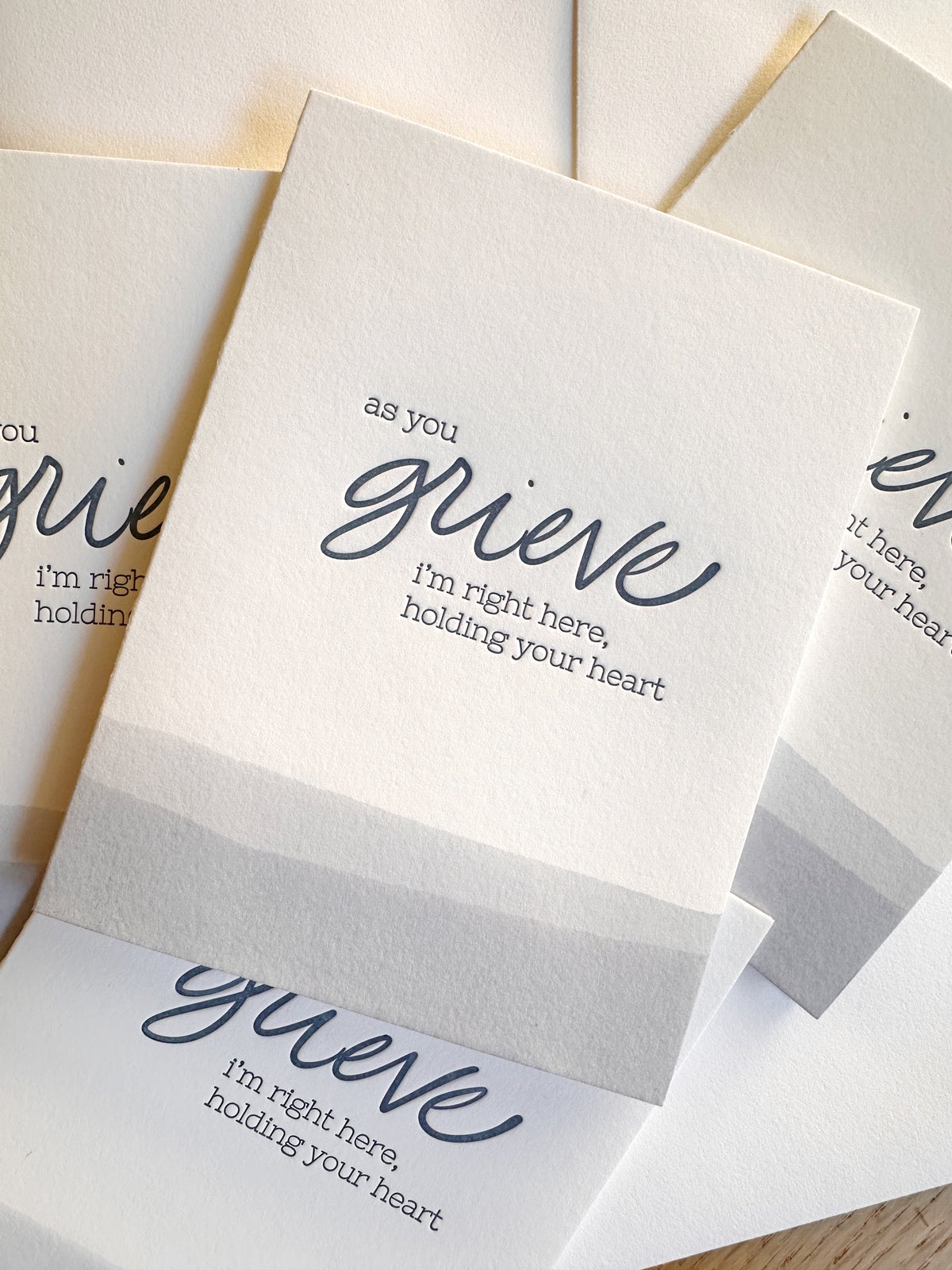 Folding white card with "as you grieve" letterpress printed. Sympathy card for those grieving.