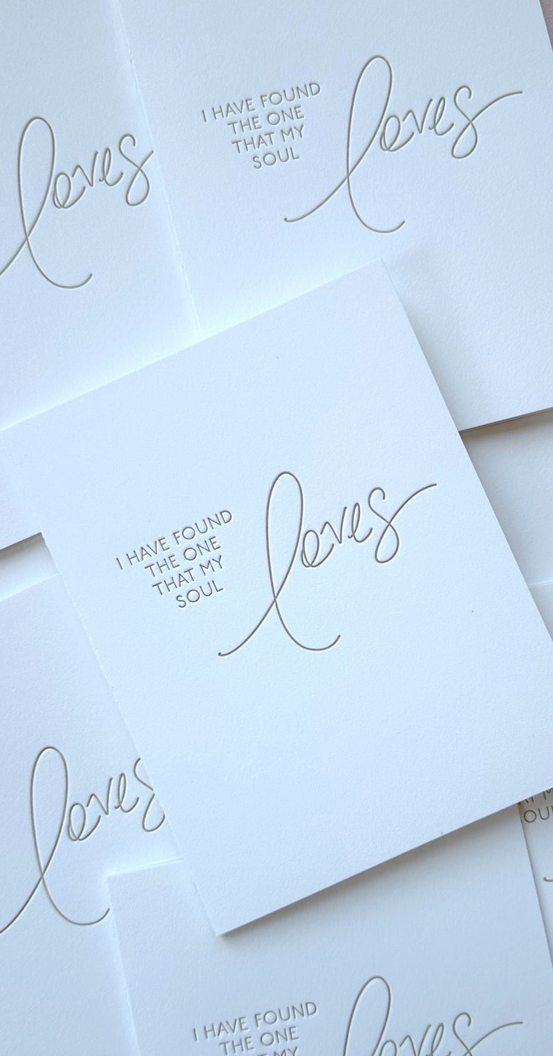 Letterpress card with gold ink saying, "I' have found the one that my soul loves." 
