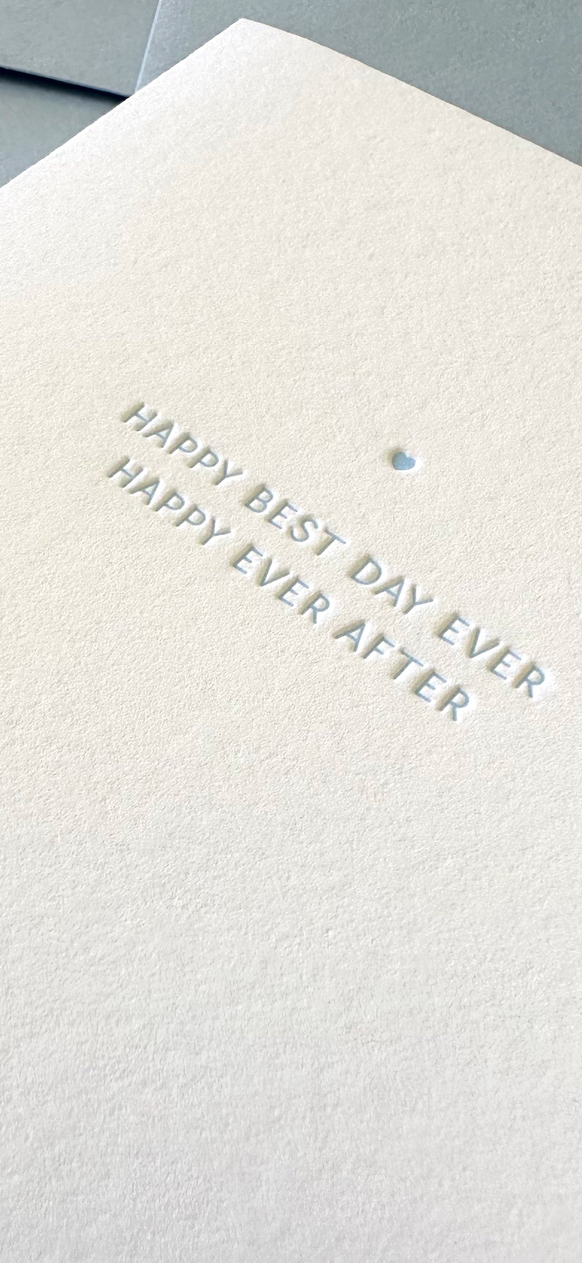 Wedding card with a tiny heart with happy ever after in "something blue."