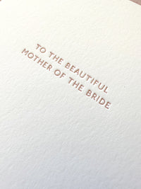 Letterpress card saying, 'To the beautiful mother of the bride" perfect for the wedding day.